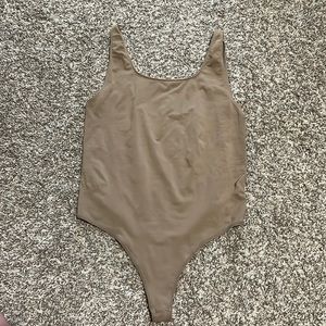 Skims fits everyone body suit in khaki size large